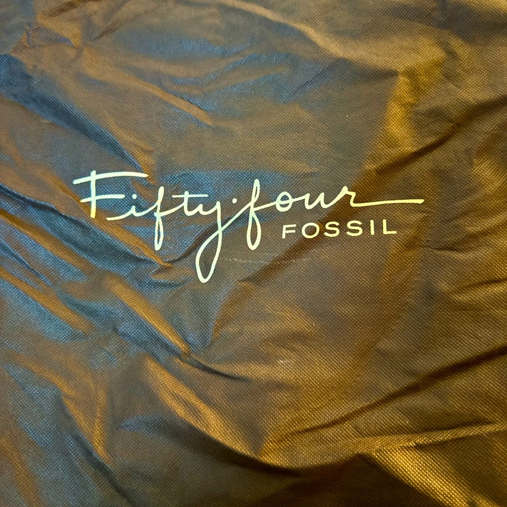 Retro feel Fossil Brand bag with duster bag.